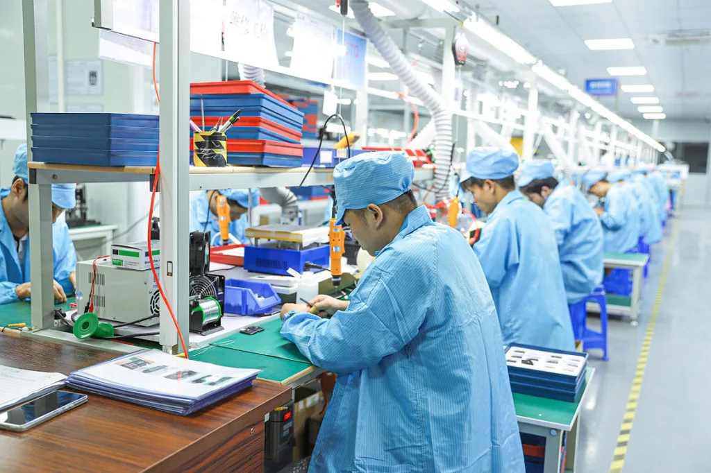Starmax Employees Working on the Smart Watch Production Line