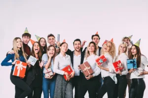 Happy Employees Holding Corporate Gifts
